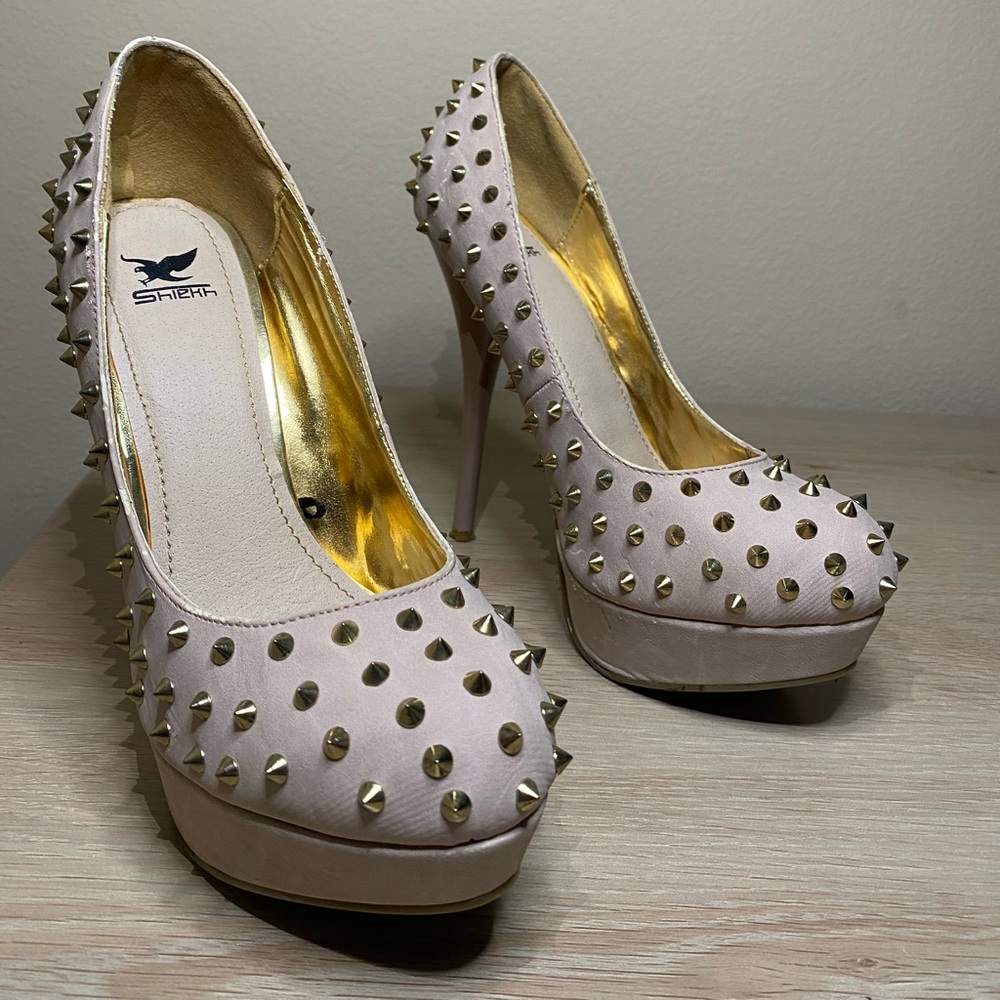 Nude platform spiked heels